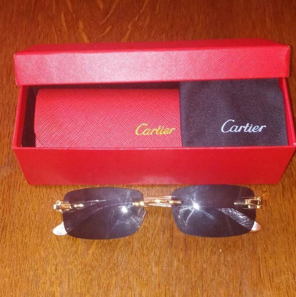 Authentic Cartier rimless buffs brown